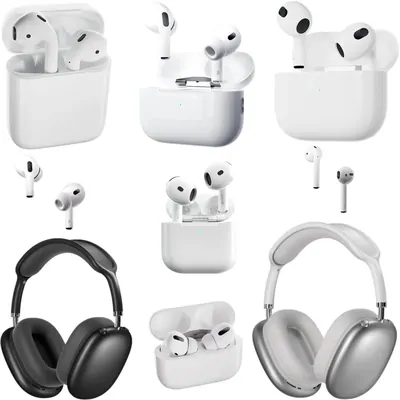 White wireless earbuds in charging cases beside two pairs of over-ear headphones in grey and silver